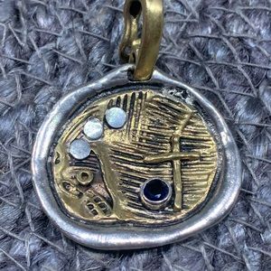 Waxing poetic waxy charm pendent